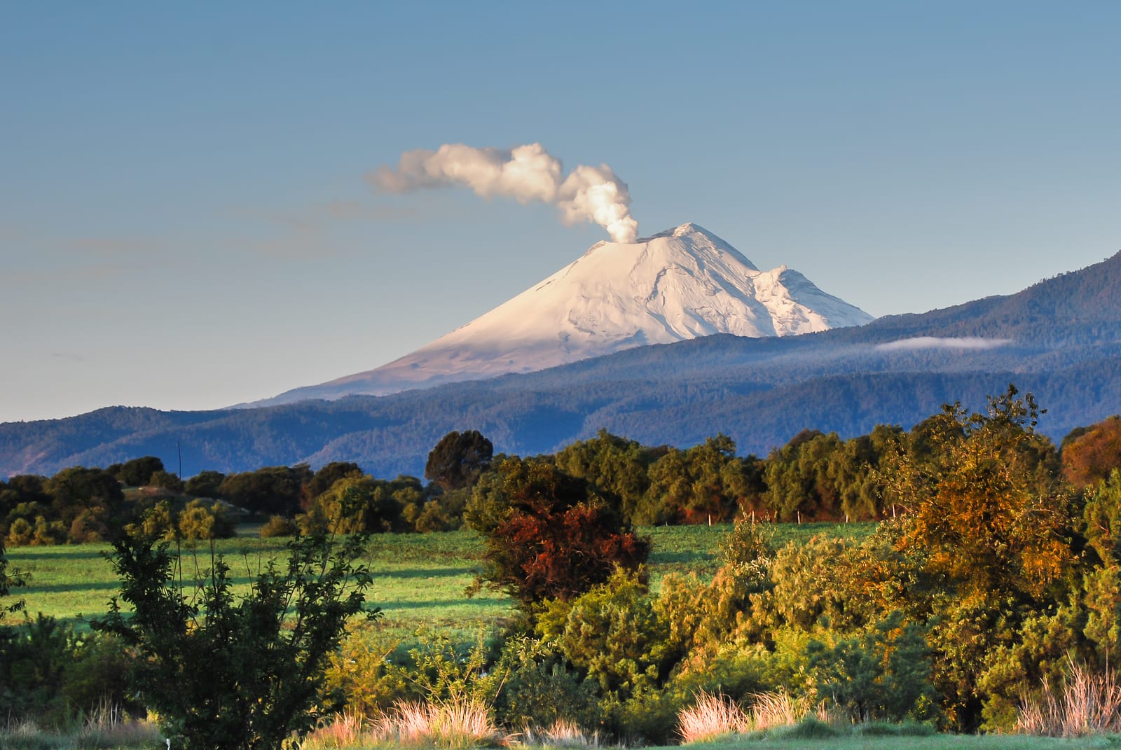 Popocatépetl volcano letting off steam above the countryside