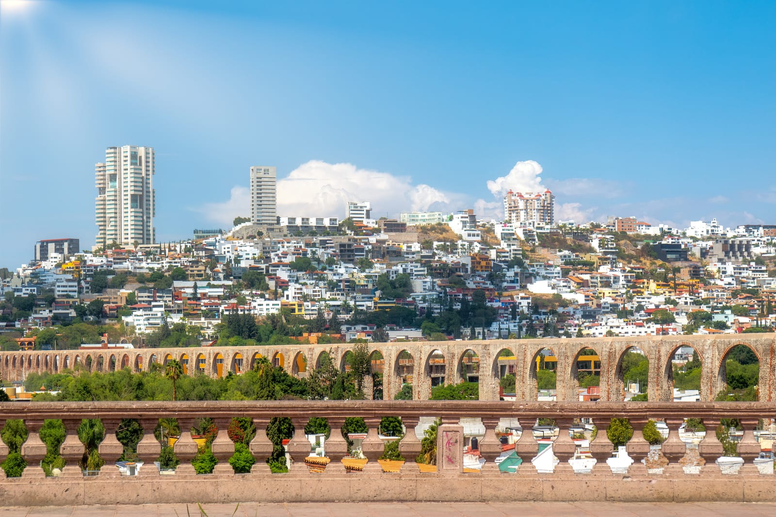 Querétaro's stone aqueduct with the city on the hillside behind